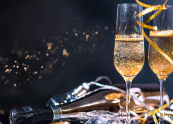 Elegant New Year’s celebration at The Grafton Hotel in Dublin with champagne glasses, festive ribbons, and sparkling lights.